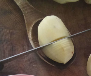 Slicing hasselback potatoes